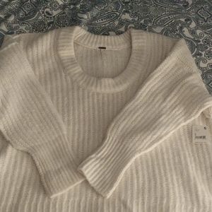Free People ivory bulky knit hi-low sweater. New with tags